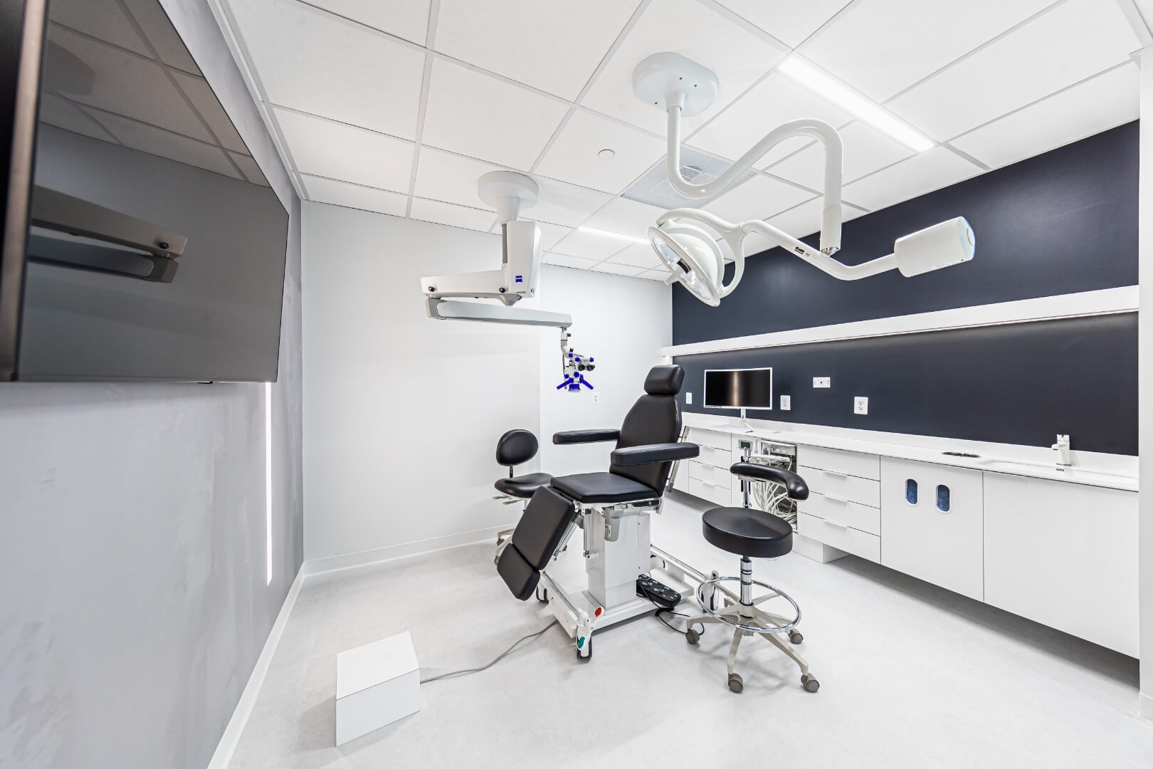 Modern, minimalist side view of patient exam room