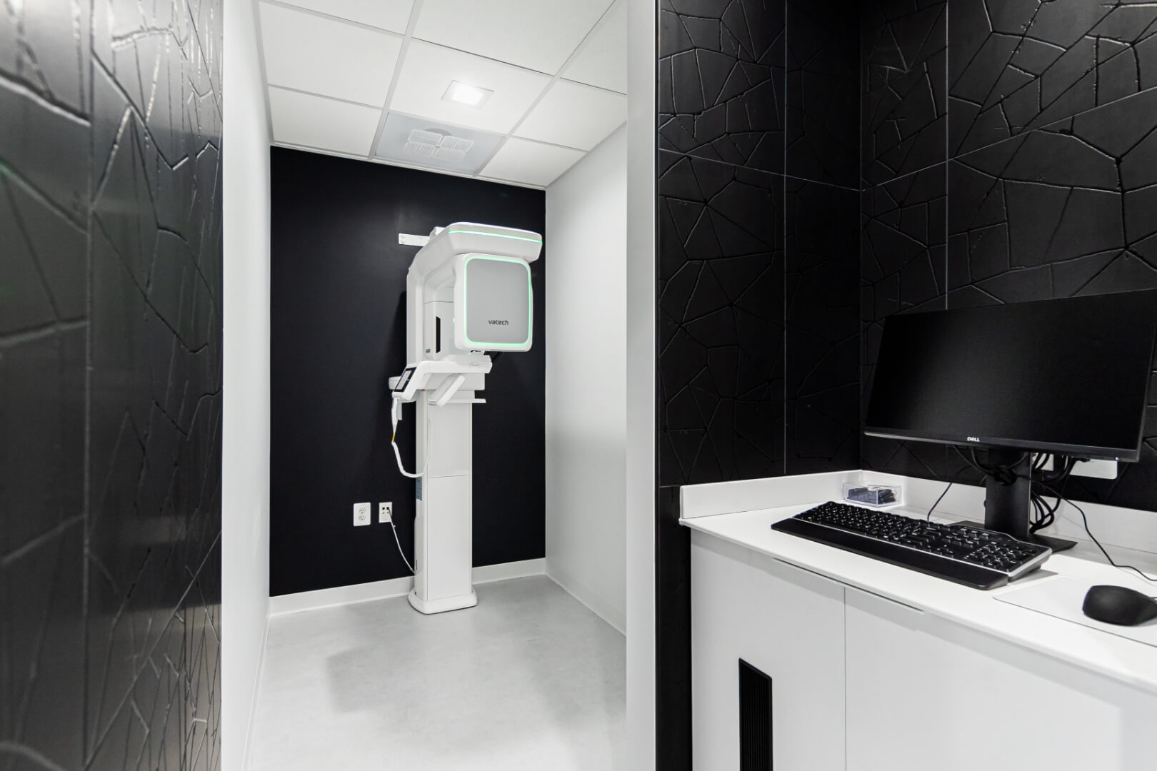 Side view of a modern, minimalist exam room